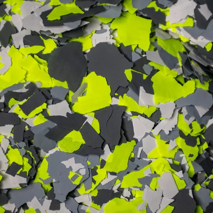 Neon Green flake blend, high-visibility green against black and grey one-inch chips